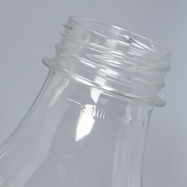 Botella reutilizable plástico transparente 1L con tapón rosca